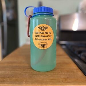 Mothman ate my entire ass 3” yellow sticker